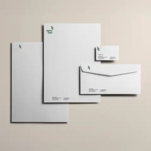Identité visuelle de Alpha Tops utilisée sur du papier à lettres, une page de suite, des cartes de visite et des enveloppes