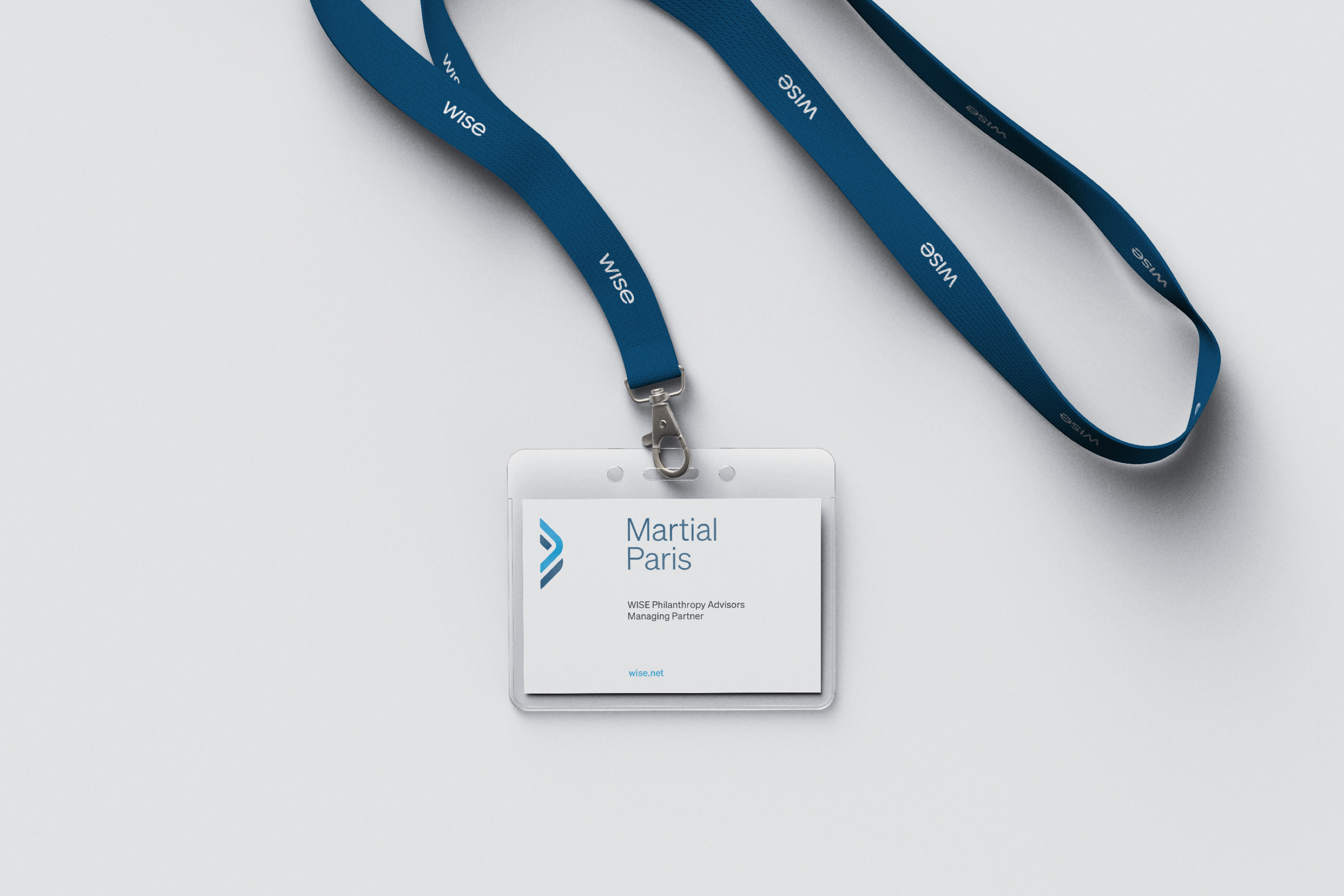 Identité visuelle réalisé par aminima pour WISE Philanthropy Advisors utilisée sur un badge de participant à un évènement professionnel